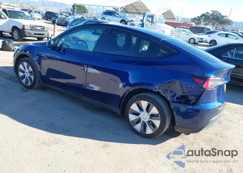 2023 Tesla Model Y Awd/Long Range Dual Motor All-Wheel Drive z USA, uszkodzony, nr VIN 7SAYGDEE3PF596164